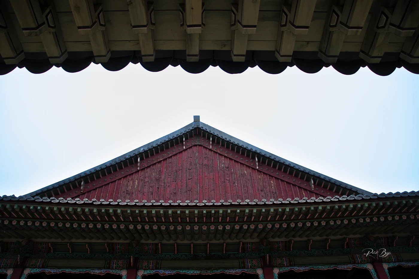 Traditional roof framed by another roof