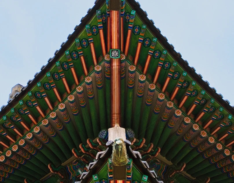Painted eaves of a traditional Korean palace roof